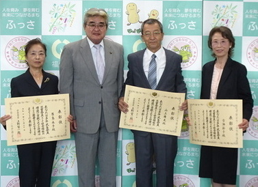 写真：厚生労働大臣特別表彰伝達式